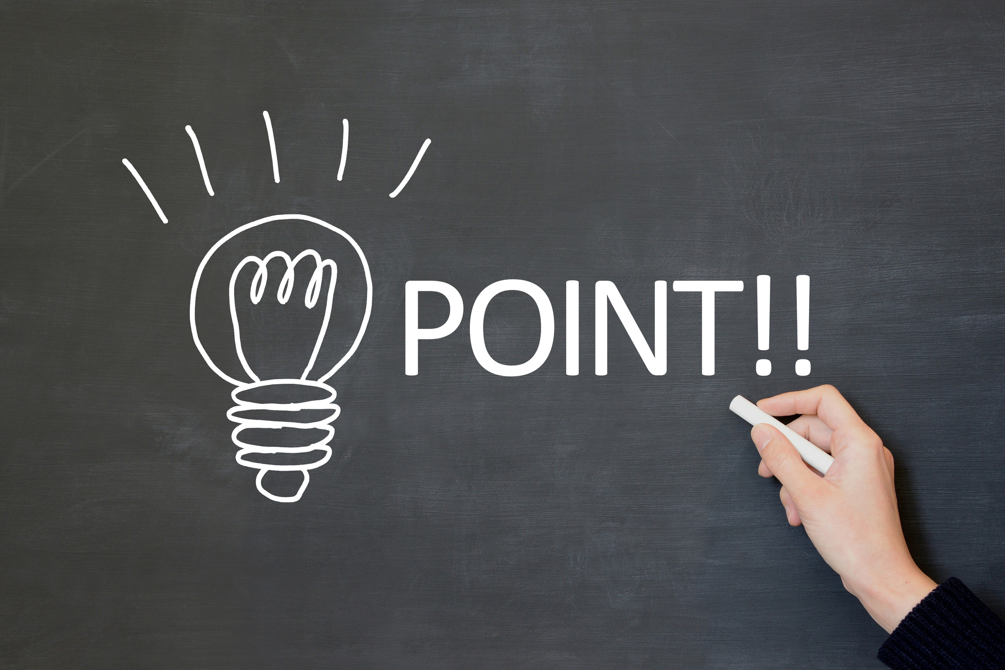 Magnifying glass with question mark in focus on wooden background. concept of search and research. search for an answer to question